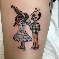 There is an added 10 seconds after the adults were in the attic searching for the ghost where we see the desert monster trying to eat adam and barbra as they hang from the attic window. Kreativekingdom Beetlejuice Tattoo Tattoos Cartoon Tattoos