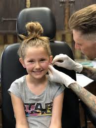 Whether you're having a simple cartilage piercing or are looking for something more unique such as dermal piercing, there are great shops that can help you achieve your desired look safely and with expertise. Video I Got My Kids Ears Pierced At A Tattoo Shop And Here S How It Went Burbank Mom