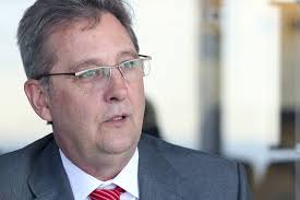 Dover Cuts Forecast; Wayne Deal Delayed