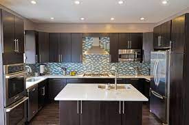 These are our favorite contemporary kitchen cabinet ideas. Blue Back Splash With Dark Cabinets Cabinets Too Modern But A Good Idea Dark Kitchen Cabinets Distressed Kitchen Cabinets Grey Kitchen Walls
