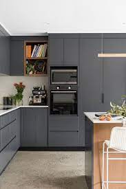 Kitchen Design Clean Lines Natural Palette Dark Tones Kitchen Design Kitchen Cabinets With Black Appliances Handleless Kitchen Cabinets