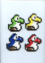 Baby Yoshi S By Frost Claw Studios Perler Beads Designs Beading Patterns Bead Designs