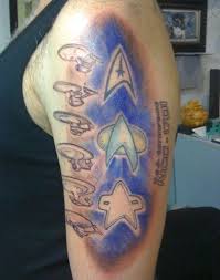 Their star trek dedication on their sleeve (and other body parts). Spocktopus More Trekmovie Reader Star Trek Tattoos Star Trek Tattoo Sleeve Tattoos Tattoos
