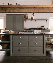 Black Granite Worktops And Chrome Catches Mixed With Classic Vintage Pieces Creates A Cool Modern Rustic Devol Kitchens French Country Kitchens Country Kitchen