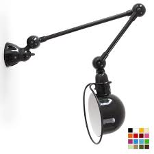 A favorite for commercial signs, panels and artwork, these versatile hanging clips yield sturdy displays while remaining hidden from view. Solid Hinged Arm Wall Light Loft D4251 Casa Lumi