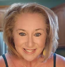 Grits and sausage gravy with fried biscuits