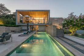 Photo gallery with best modern pool designs in 2021 including modern pool ideas, patio landscaping around a swimming pool and inground pool cost. 25 Beautiful Modern Swimming Pool Designs