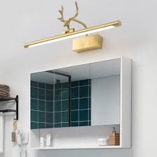 The first thing i noticed when i did a survey of the old bathroom was that my clients had wires stretched across long spans when i designed the wall cabinet i drafted a cutout at the back so that items like an electric razor or electric toothbrush could be charged inside the cabinet. Tubular Vanity Light With Antler Mid Century Modern Adjustable Led Wall Mount Light In Gold Beautifulhalo Com