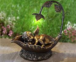 Original Gift Company Sleeping Cherub Solar Light Polyresin Add An Enchanting Glow To A Special Area Of Your Garde Solar Lights Original Gift Garden Ornaments