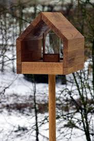 Eichenholz Vogelfutterhaus Mit Satteldach Futtertablett Silo Inkl Stander 46601e Vogelfutterhaus Vogelhaus Mit Stander Moderne Vogelhauser