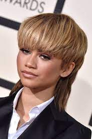 Are You Ballsy Enough To Pull Off The Modern Mullet All The Cool Girls Are Wearing Mullet Hairstyle Modern Mullet Girl Haircuts