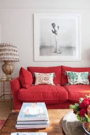 A long, soft seat for two or more people, with a back and usually with arms 2. 8 Exciting Ways In Which Colorful Sofas Create A Dreamy Contrast In Your Living Room Daily Dream Decor Red Couch Living Room Red Sofa Living Red Couch Decor