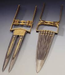 The katar is a type of short punching sword that was used in persia and northern india. Pin On Katar Indian Push Dagger