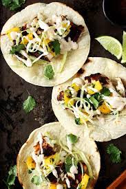 Heat oil in a skillet over medium high heat. Easy Tilapia Fish Tacos With Mango Salsa And Slaw Monday Sunday Kitchen