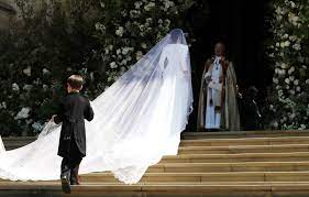 A stylized bird with an open mouth, tweeting. The Touching Detail About Meghan Markle S 16 Foot Wedding Veil Meghan Wedding Dress Details