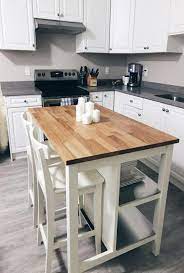 I like it a lot. 49 Gorgeous Farmhouse Gray Kitchen Cabinet Design Ideas Kitchen Island With Seating Ikea Ikea Kitchen Island Kitchen Island With Seating