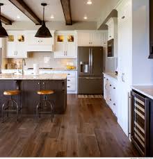 Britany tied the look together with second only to white in terms of popularity, espresso kitchen cabinets are a beautiful, elegant deep dark brown that pairs well with classic whites and. White Transitional With Brown Stained Island Transitional Kitchen Tampa By Cabinet Collection Llc Houzz