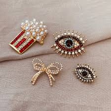 eye brooch
