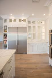Huge range of colours available to match your interior colour scheme. Contemporary White Kitchen With Shaker Cabinets Marble Countertops Double Ovens And Wood Floo Kitchen Remodel Cost Kitchen Remodel Countertops Home Kitchens