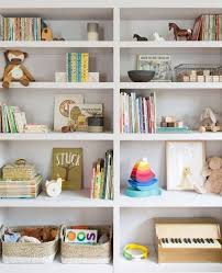 Having a kids bookshelf in a child's bedroom or playroom can encourage your little ones to enjoy the written word. How To Design Bookshelves In A Kids Room Domino Kids Room Shelves Kids Room Bookshelves Bookshelves Kids