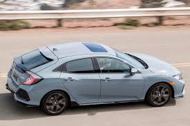 The 2021 civic hatchback comes standard with a turbocharged engine that produces 174 horsepower* and turns every green light into a celebration of acceleration. 2019 Honda Civic Hatchback Review Trims Specs Price New Interior Features Exterior Design And Specifications Carbuzz