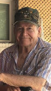 Robert “Buck” Buchanek