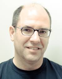 I said, "Could you write, 'bacon and cigarettes, a lousy dinner'?" He  looked up at me through those thick blue Lennon glasses that have become  his solo career trademark, and asked, "What