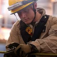 Aviation Boatswain's Mate (Handling) 1st Class Derek Faust acts as team  leader as Sailors handle fire hoses during a flight deck drill aboard the  Nimitz-class aircraft carrier USS Abraham Lincoln (CVN 72). -