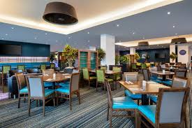Connected london heathrow airport terminal 4 via a covered linked bridge holiday inn express london heathrow t4 offers accommodation with free wifi and breakfast included. Holiday Inn Express Heathrow T5
