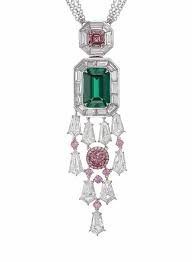 The Earth Magic Necklace Features A 5 25 Carat Muzo Emerald And Two 1 77 Carat Argyle Pink Diamonds Us 4 Argyle Pink Diamonds Pink Diamond Colored Diamonds