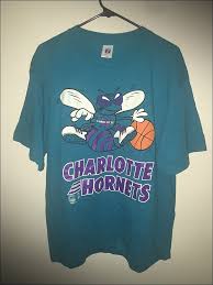Charlotte hornets snoopy dabbing shirts ; Vintage 80 S Nba Charlotte Hornets Logo 7 Shirt Size Xl By Rackraidersvtg On Etsy Charlotte Hornets Logo Mens Tops Shirts
