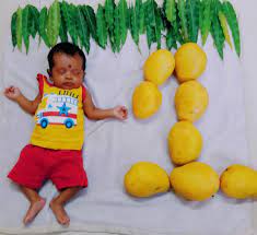 mango theme baby photoshoot first month vedik baby photoshoot monthly baby pictures baby month by month