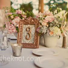 Dina Made All Of The Table Numbers From Vintage Frames She Painted Them Antique Gold Table Numbers Wedding Wedding Table Numbers Wedding Table Numbers Vintage