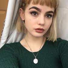 her eyebrows are atrocious but that helix is in the perfect spot