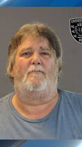 Man accused of illegally possessing, transporting loaded weapons in Coventry