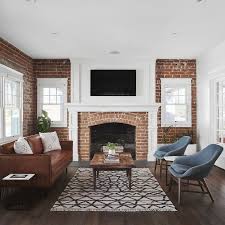 Rafterhouse Bungalow Seating Area With Exposed Brick Walls And Fireplace Brick Living Room Brick Wall Living Room Fireplace Seating