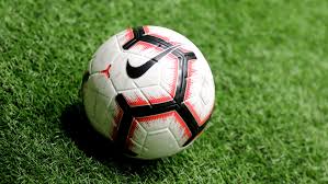 A round, black and white ball used in the game of soccer, which is known as football in much of the world. Aktivitetsturnering Varen 2021 Norges Fotballforbund