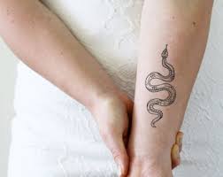 Snake tattoos have have been a stable motif in the tattoo industry ever. Snake Tattoo Etsy