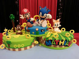 With the increase in popularity of video games, sonic the hedgehog has become a very popular birthday party theme. Torta Mario Y Sonic Sonic Birthday Sonic Birthday Parties Sonic Birthday Cake