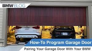 It is easy to see the red / orange square shaped learn button. How To Program Your Garage Door Opener In Your Bmw Homelink
