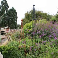 Metal garden obelisk climbing plant obelisks climber planter stand. Harrod Vintage Wire Obelisk Harrod Horticultural
