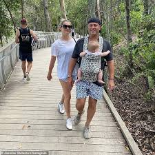 The view from inside the sunshine beach house. Karl Stefanovic Holds Daughter Harper In A Baby Carrier As He And Wife Jasmine Enjoying A Bushwalk Readsector Female