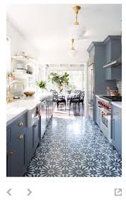 Blue Grey Kitchen Cabinets With Brass Hardware And Schoolhouse Lighting Love These Pattern Floor Tiles Kitchen Redesign Kitchen Remodel Small Kitchen Design