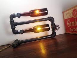 With a little work and time you can 1up all your friends with a great new look for your bar lighting. Bold Beer Bottle Lamps Beer Bottle Lamp