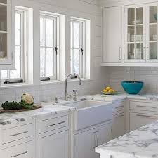 White Dove Cabinets Transitional Kitchen Benjamin Moore White Dove At Home In Ar Calcutta Gold Marble Kitchen Kitchen Marble Marble Countertops Kitchen