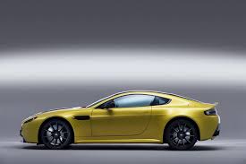 Image result for Sunburst Yellow 2017 Aston Martin