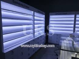 Ask about the availability of used showcases. Cell Phone Case Wall Display Cabinet With Many Shelves And Drawers