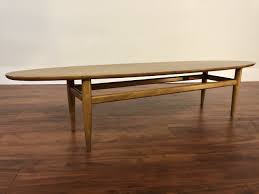 Coffee table measures 65 x 17 inches and stands 14 1/4 inches tall. Sold Heritage Henredon Oval Mid Century Coffee Table Modern To Vintage