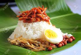 Lately a lot of blogger friends serving pandan nasi lemak (coconut fragrant rice with screwpine leaves extract). Nasi Lemak Is A Malay Fragrant Rice Dish Cooked In Coconut Milk Stock Photo Picture And Royalty Free Image Image 83400964