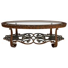 You can place them in your garden, offices, hotel, villas or any other space, and enhance the entire appeal of the interior. Spanish Oval Decorative Wrought Iron And Glass Coffee Table Circa 1940s For Sale At 1stdibs